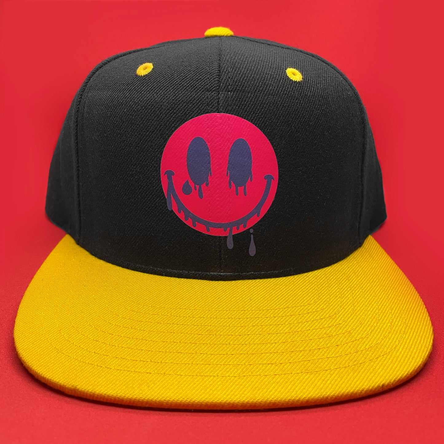 Serie Smiles 2023: SnapBack con cara sonriente derretida en rosa/azul