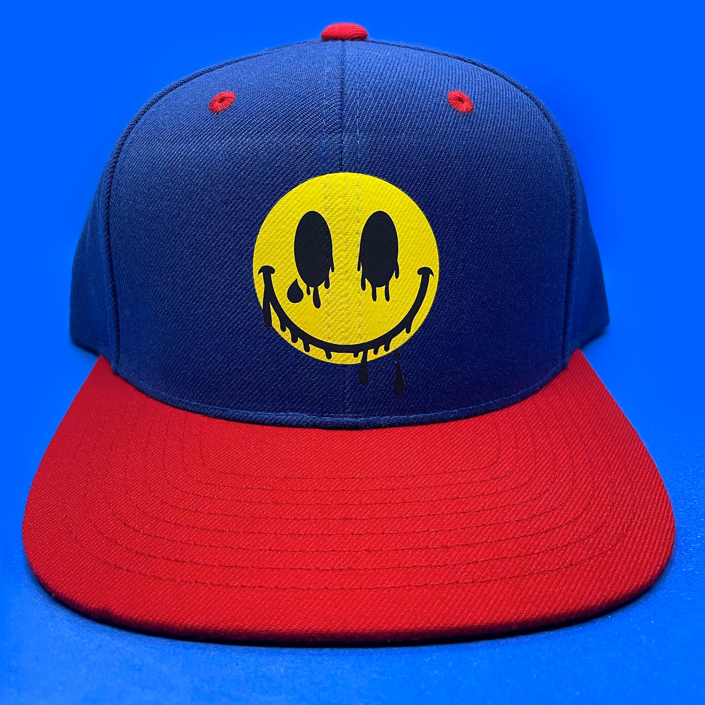 2023 Smile Series: Yellow/Black Melting Smiley Face SnapBack